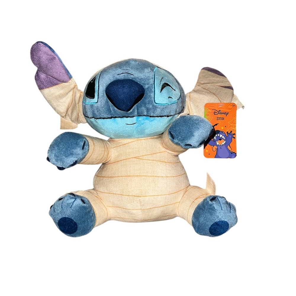 Disney Stitch plush toy dressed in a mummy costume for Halloween